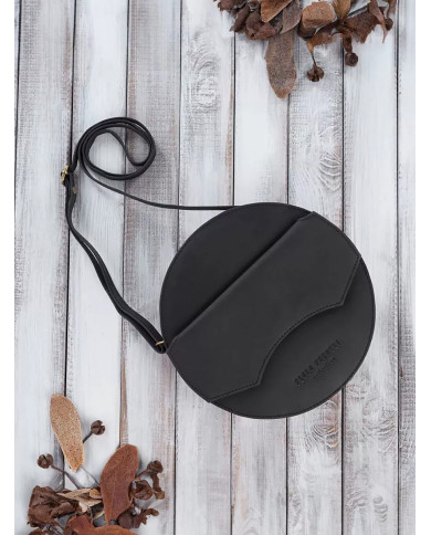 Juoda apvali sendintos odos rankinė