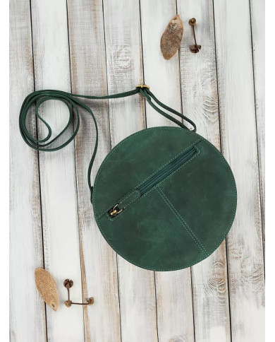Apvali žalia sendintos odos rankinė su reguliuojamu dirželiu